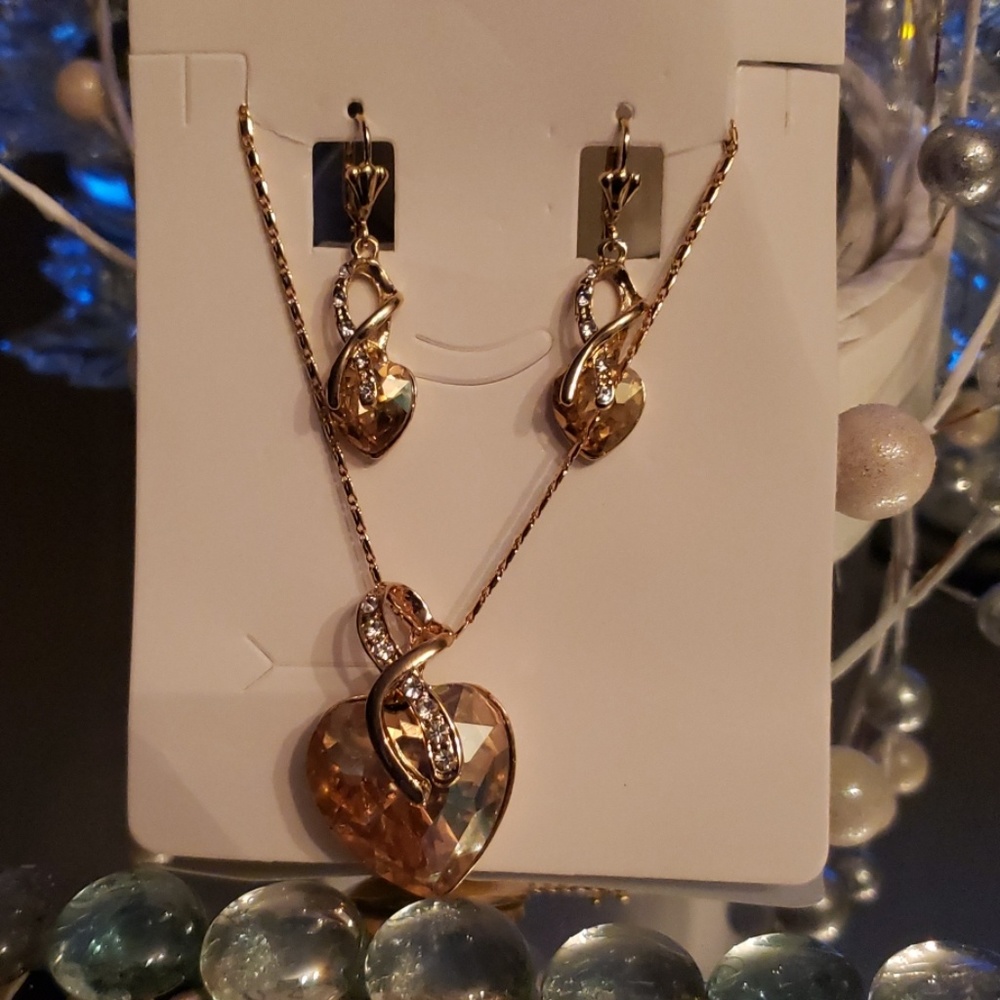 New set of earrings and necklace .